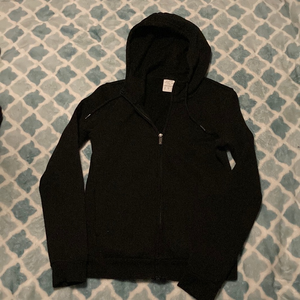 Black “Care of” by Puma size XS fitted zippered hoodie